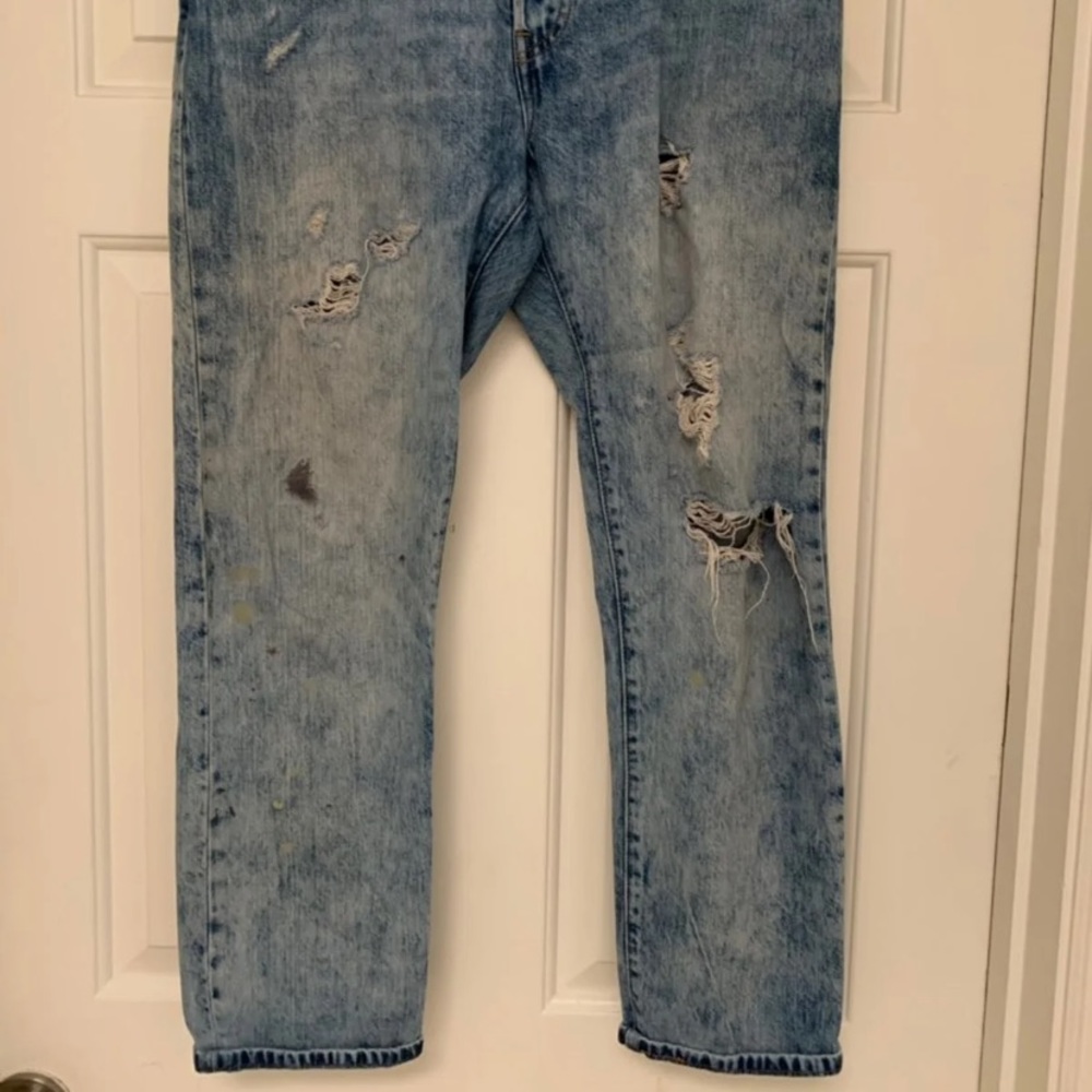 Levi’s 501 boyfriend jeans. Distressed / cropped